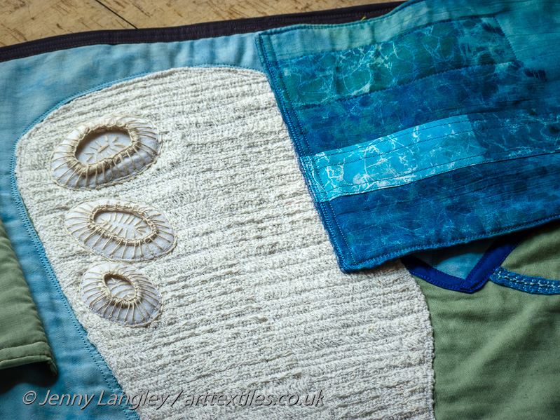 The sea flap reveals coccoliths, the plates of calcium carbonate which make up the chalk.