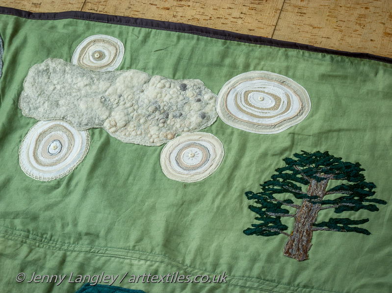 Panel of oolitic limestone and the Great Cedar of Lebanon, believed to be the largest of its kind in Europe.