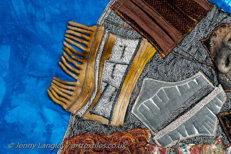 Textured pieces on rocky area. Made from a wool scarf and a Loki pocket developed from the storyteller's jacket commission.